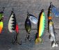 Several multi-colored fishing lures.