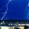 Lightning over a city at night