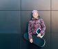 Trendy grandmother with skateboard