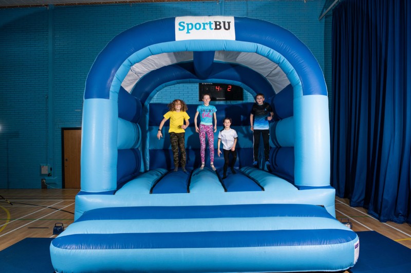 Children on a bouncy castle